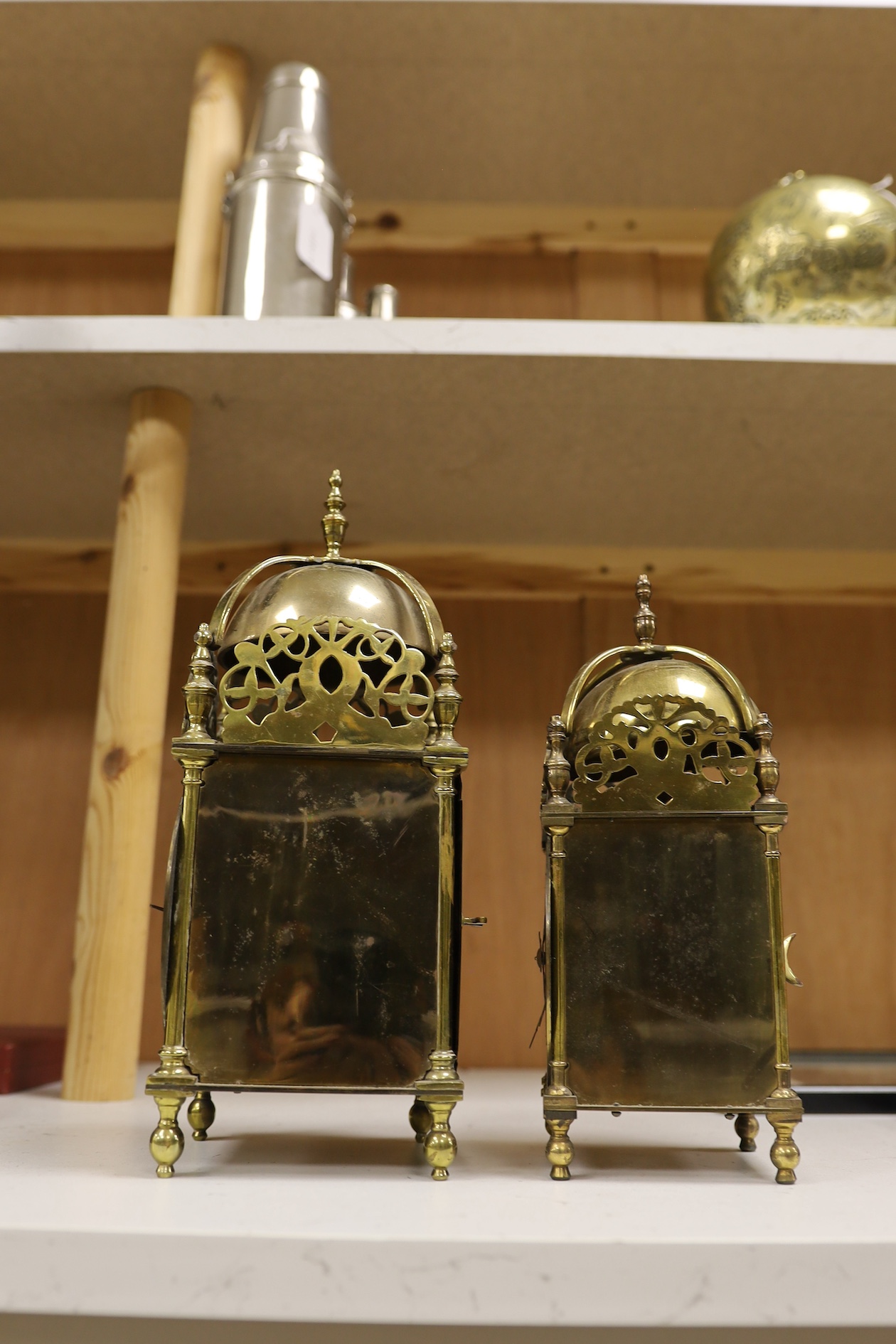 Two brass lantern clocks with 20th century escapement units, tallest 30cm high. Condition - fair